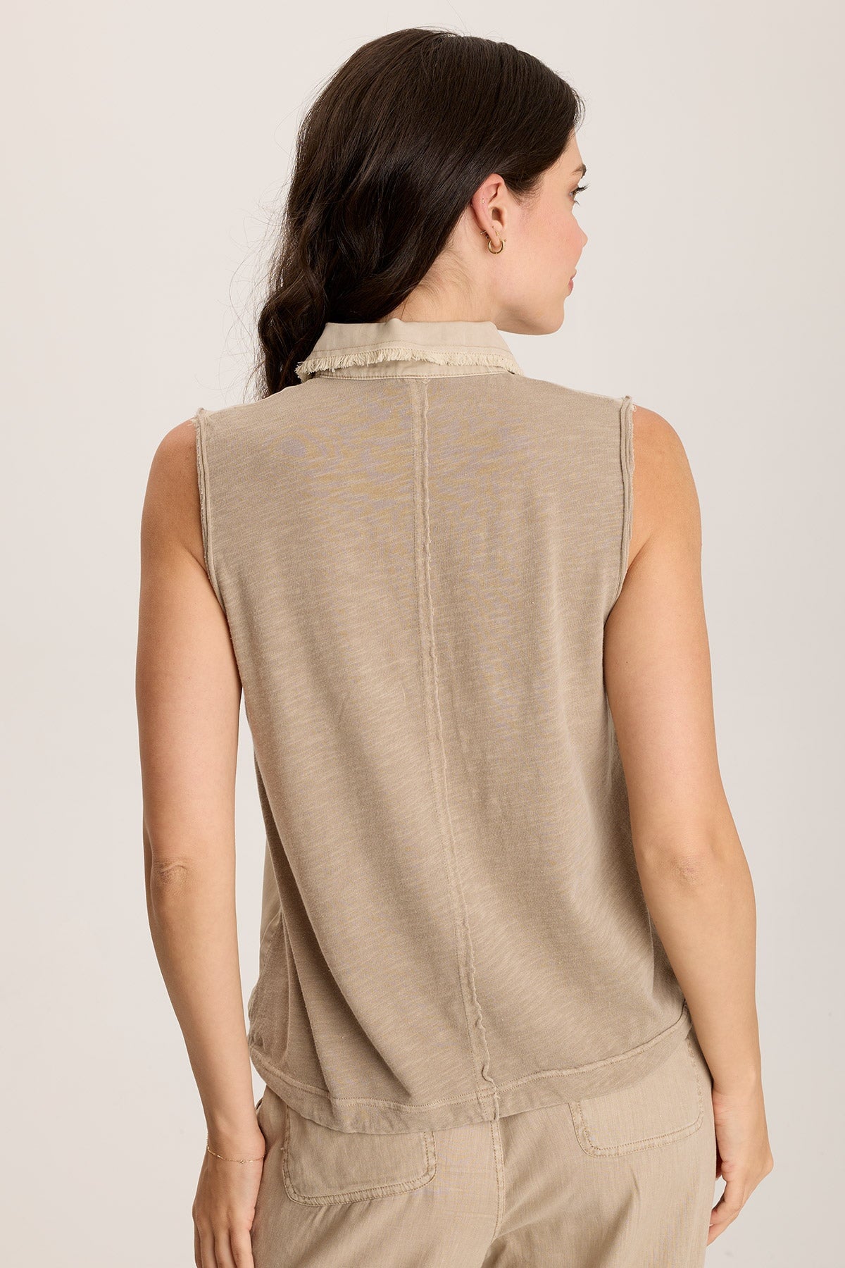 Rein Sleeveless Polo with Snap Front & Cinched Hem